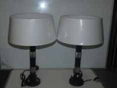Pair Of Black And Silver Designer Table Lamps With Oversized White Shades From A High-End Lighting