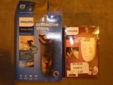 Lot To Contain Two Assorted Items To Include A Philips Triple Head Shaver And Philips Stainelle