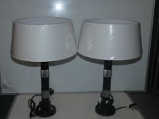 Pair Of Black And Silver Designer Table Lamps With Oversized White Shades From A High-End Lighting