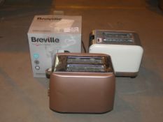 Lot To Contain Three Assorted Kitchen Items To Include Two Slice Toasters And A Boxed Breville