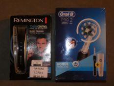 Lot to Contain 2 Boxed Assorted Oral B Pro 2 Toothbrush and a Remington Touch Control Beard Trimmer