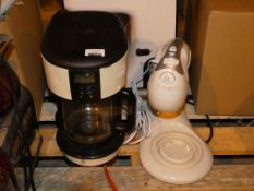 Lot to Contain 2 Assorted Items To Include a Breville Hand Mixer and a Ten Cup Coffee Maker