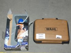 Lot to Contain 2 Boxed Assorted Items to Include a Wahl Beard Trimmer and a Remington shaver
