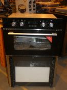 Stainless Steel and Black Fully Integrated Electric Oven in Need of Attention (Viewing Is Highly