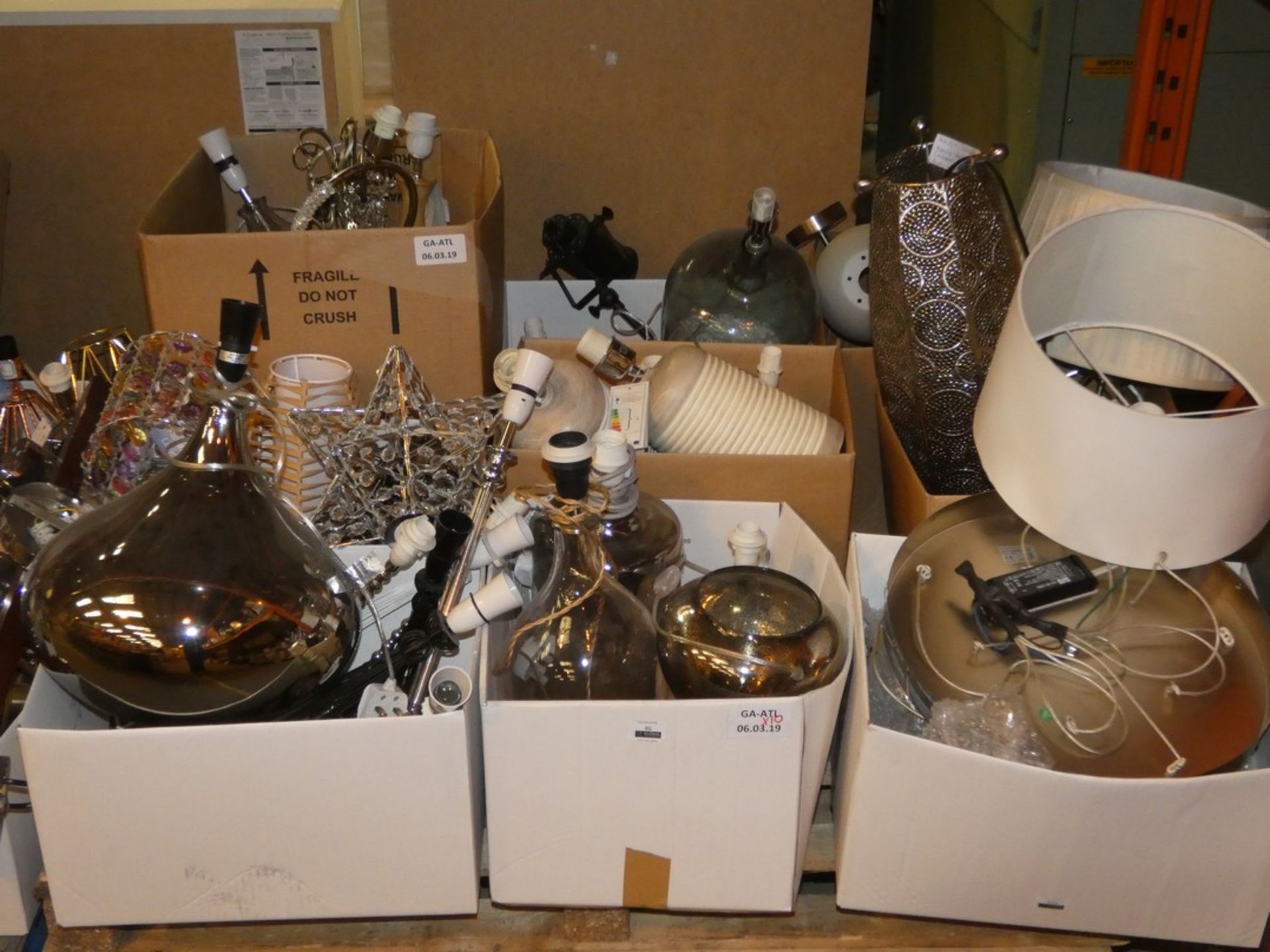 Lot to Contain a Vast Quantity of Assorted Lighting Items to Include Ceiling Lights, Table Lights,