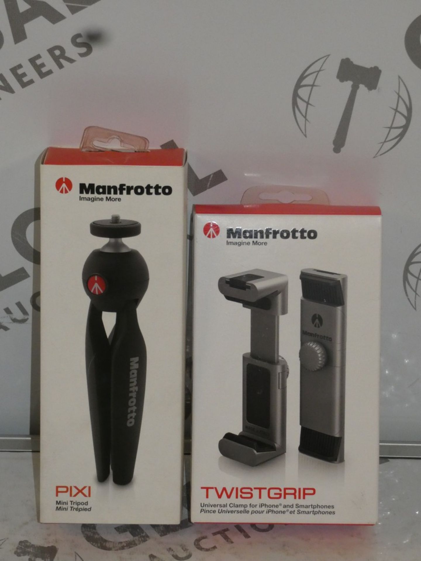 Lot to Contain 2 Manfrotto Smart Phone and Camera Accessories to Include the Manfrotto Pixie Mini
