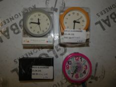 Lot to Contain 4 Assorted Clocks to Include a London Miniature Clock, 2 x Jones Alarm Clocks and a