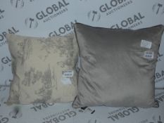 Lot to Contain 2 Assorted Cushions to Include a 55 x 55cm Meridan Poly Cushion and a Designer Art
