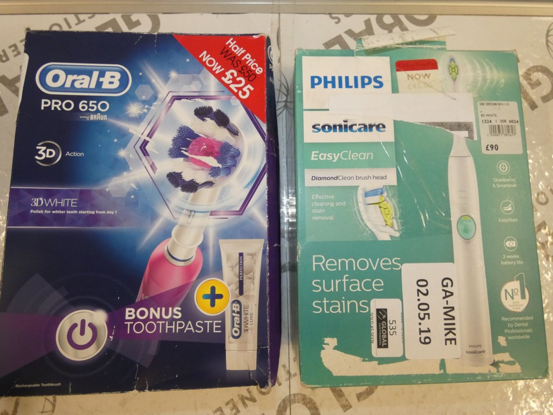 Lot to Contain 2 Boxed Assorted Items to Include a Philips Sonicare Easy Clean Toothbrush and a Oral