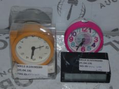 Lot to Contain 4 Assorted Boxed and Unboxed Clocks and Alarm Clocks to Include Alarm Clocks, Lexon