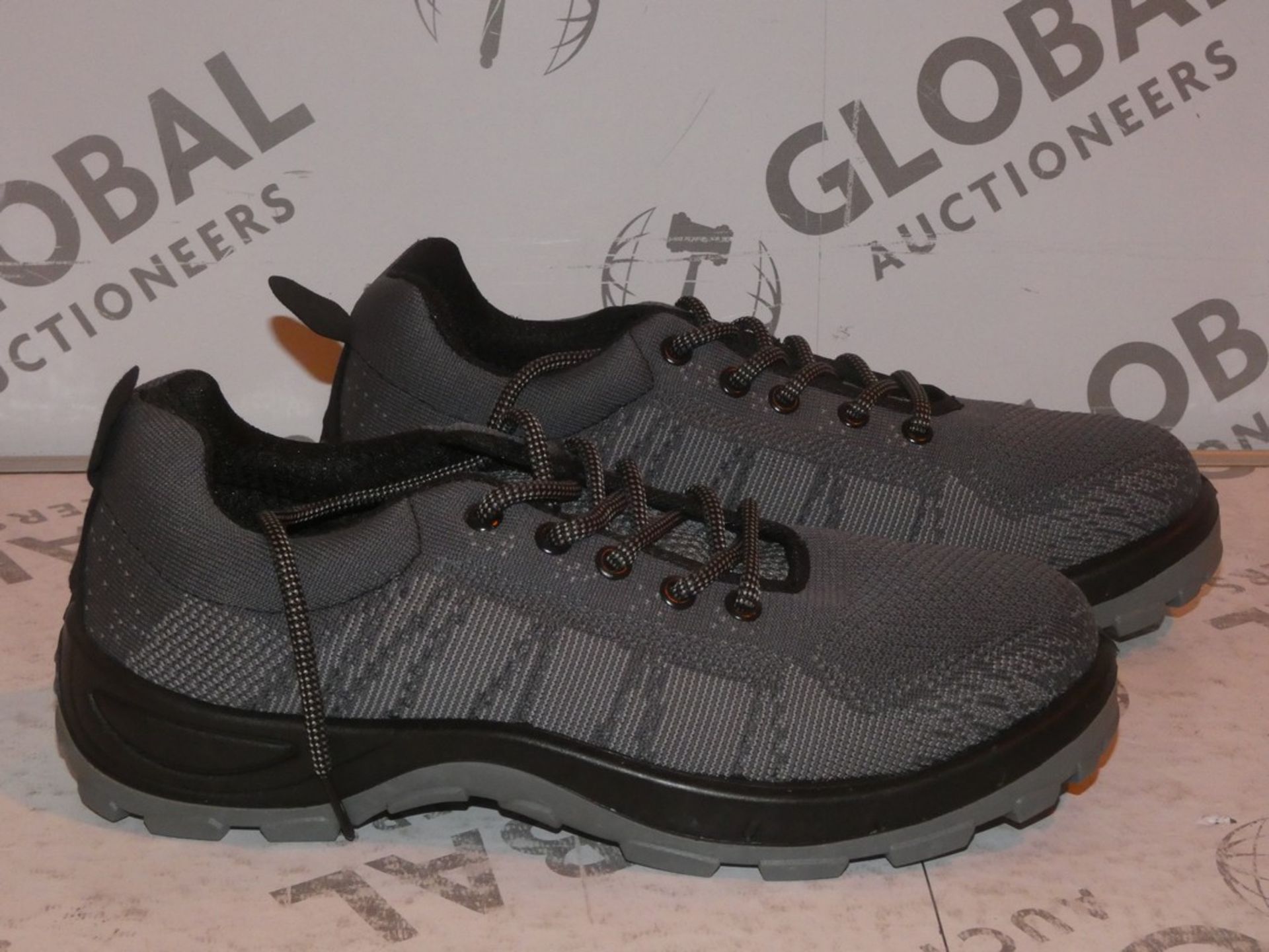 Brand New Pair of Grey Size 43 Grip Running Shoes RRP £30