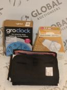 Lot to Contain 3 Assorted Baby Items to Include a Gro Clock Amazing Sleep Trainer, Gro Swaddle