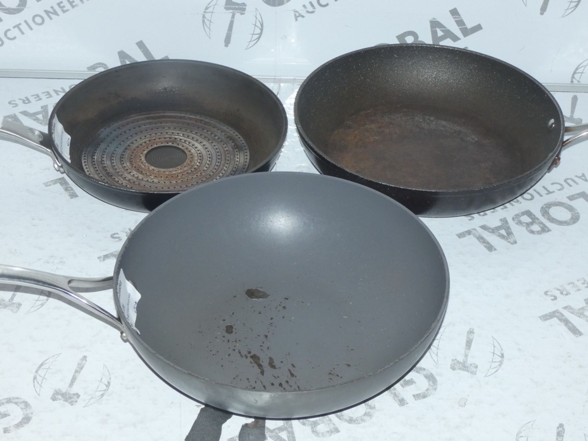 Lot to Contain 3 Assorted Never Stick 2 and Circulon Frying Pans and Woks (RET00232356)(