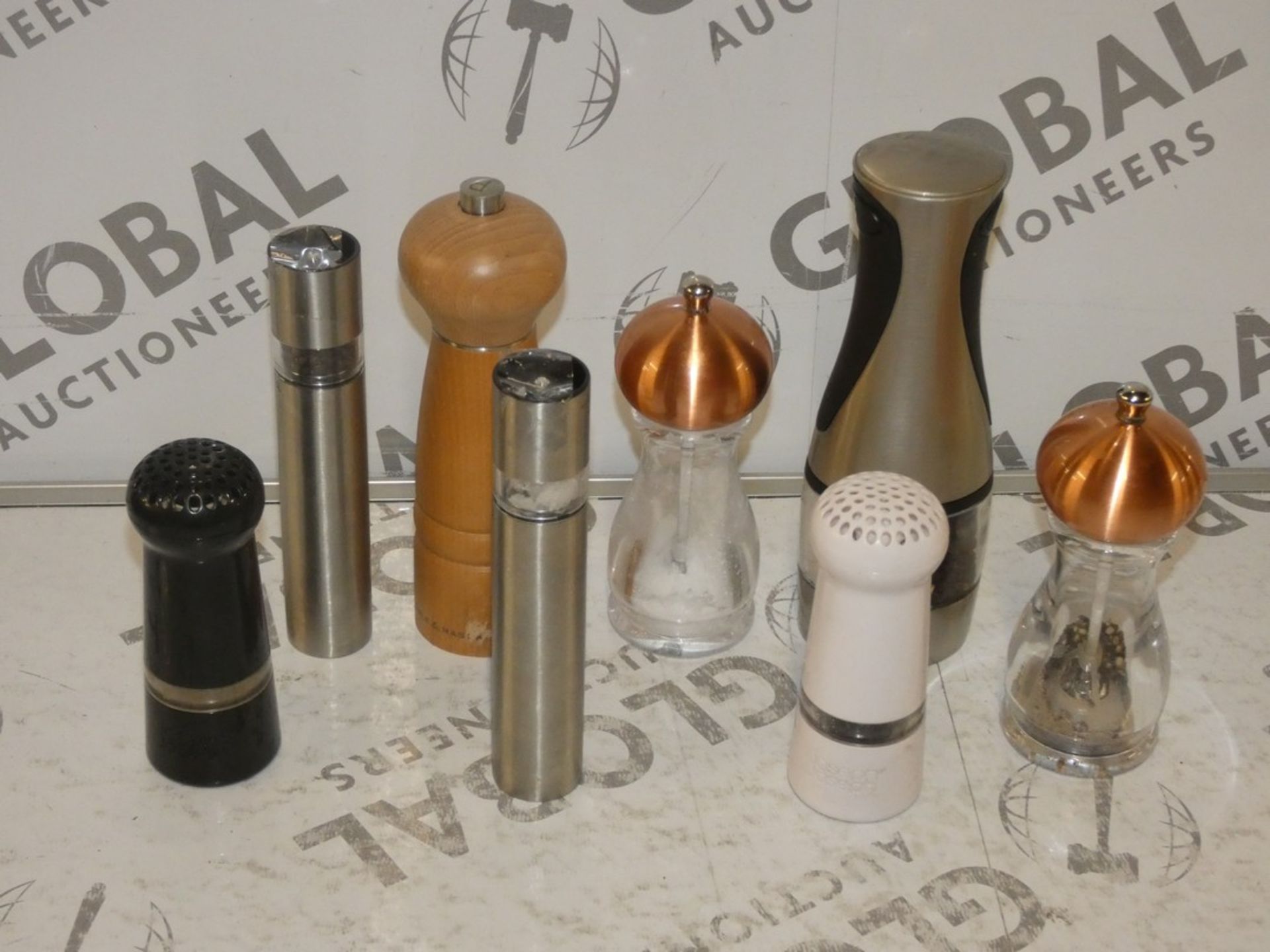 Assorted Items to Include 4 Cole and Mason Salt and Pepper Mills and 1 Joseph Joseph Salt and Pepper