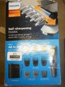 Assorted Items to Include 1 Philips Self Sharpening 9 in 1 Trimmer and 1 Philips Perfect Beard