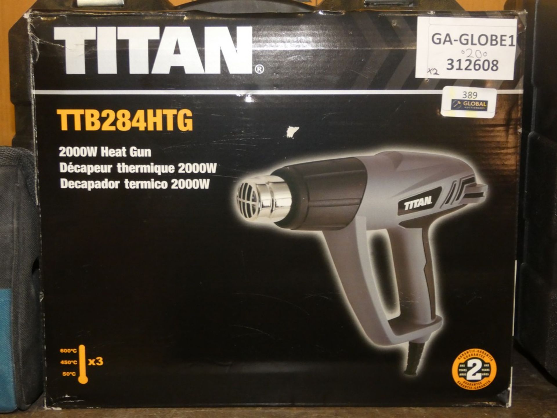 Boxed Assorted Items to Include a Titan TTB284HTG Heat Gun and a Titan TTB276DR 850w Impact Drill