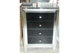 Stylish Mirrored Glass and Black Accent 4 Drawer Cabinet from Hestia. Ht 110 x W 71 x D 41 cms.