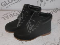 Lot to Contain 10 Brand New Pairs of Gents Black and Tan Chelsea Style Boots in Assorted Sized