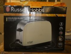 Assorted Items to Include 1 Russell Hobbs Classic Cream 2 Slice Toaster and 1 Russell Hobbs Storm