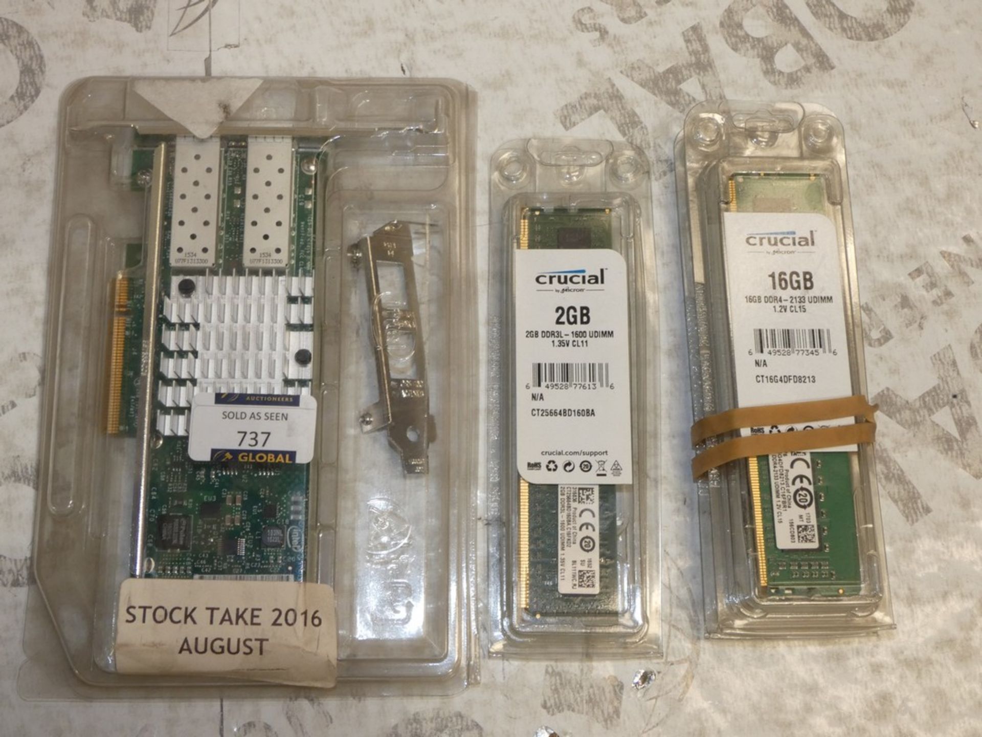 Lot to Contain 4 Assorted Items to Include an Intel ETH CONVERGED Network DA2 Adaptor, an Crucail