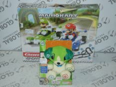 Assorted Items to Include a Leap Frog Children's Education Toy, and a Mario Cart Carrera