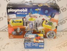 Boxed Assorted Playmobile Children's Toy Items To Include A Space Station And A Fire Fighter Pack