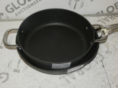 2 Assorted Pans To Include An Easy Glide Never Stick 3 2 Handled Sautee Pan And A Tefal Hot Spot Non