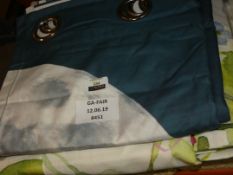 Lot to Contain 2 Assorted Items To Include Floral Bedding Set And A Moonprint Pair Of Curtains (