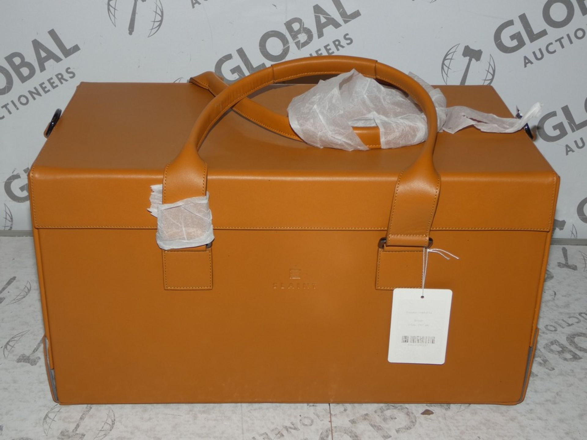 Lot To Contain 1X Slainte Tan Leather Peruvian 13 Inch Holdall RRP£600.0