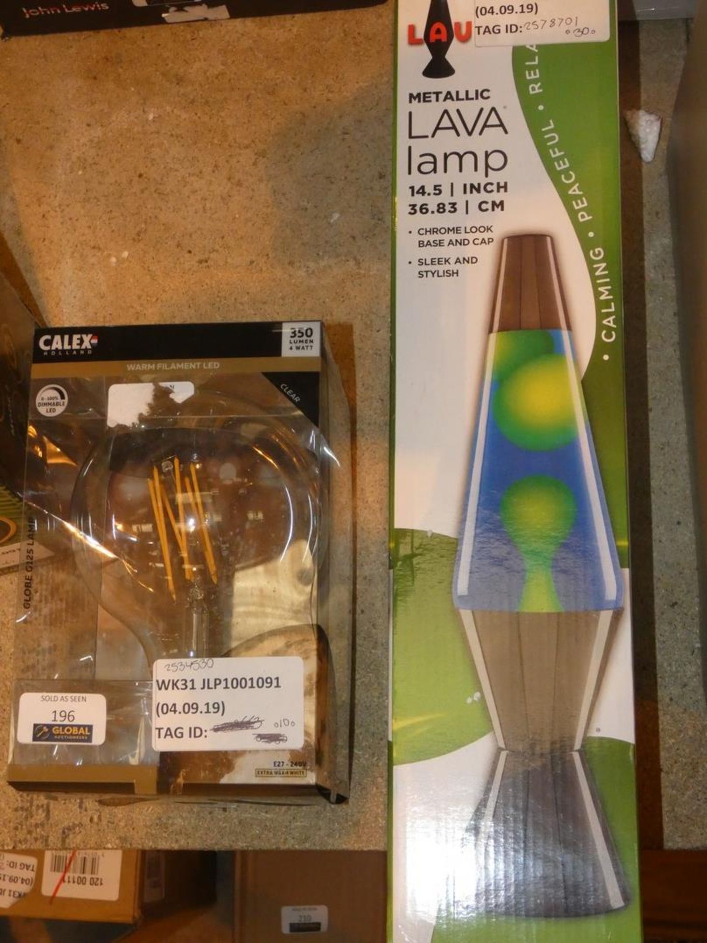 Lot to Contain 2 Assorted Lighting Items to Include a Filament Lightbulb and a Metallic Lava Lamp