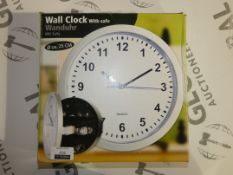Boxed Assorted Items to Include a Wall Clock With Safe and a Hose Reel (Public Viewing and