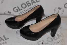 Lot to Contain 2 Brand New Pairs of Shishangjinzi Women's Black Gloss Heeled Boots in Assorted Sizes