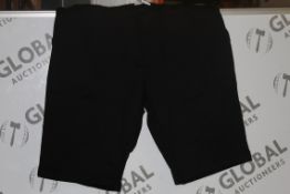 Box to Contain 16 Brand New Pairs of Black Jackamo Lounging Shorts