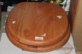 Lot to Contain 3 Assorted Boxed and Unboxed Solid Wooden Toilet Seats, Model Oak Toilet Seats and