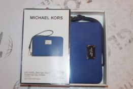 Lot to Contain 5 Boxed Brand New Michael Kors Iphone 4S, 5, 5C and 5S in Sapphire Zip Wallets