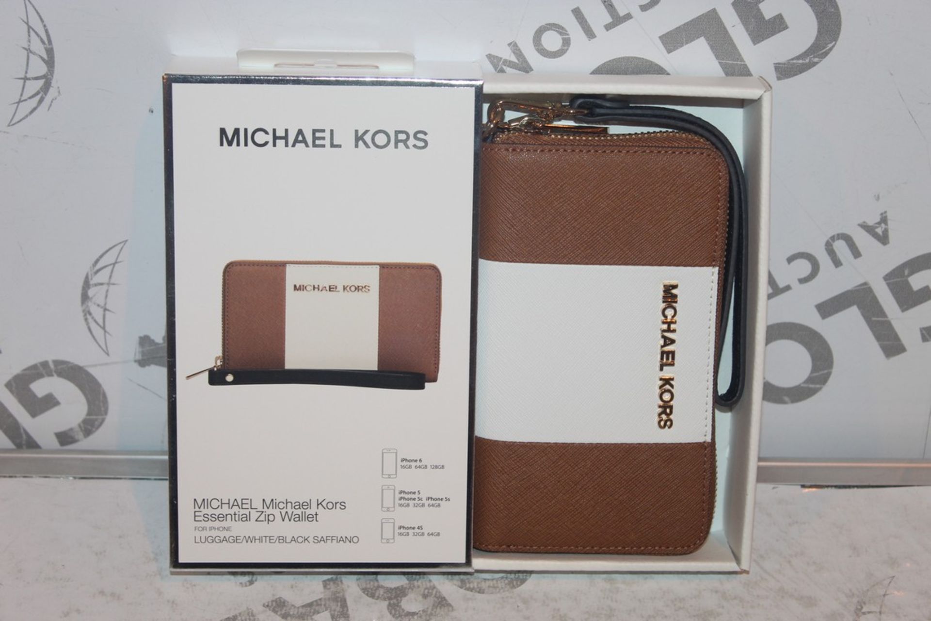 Lot to Contain 10 Boxed Brand New Michael Kors Luggage White Black Iphone 4, 5S and 6 Essential