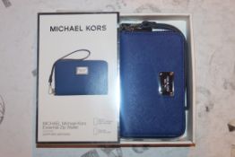 Lot to Contain 5 Boxed Brand New Michael Kors Iphone 4S, 5, 5C and 5S in Sapphire Zip Wallets