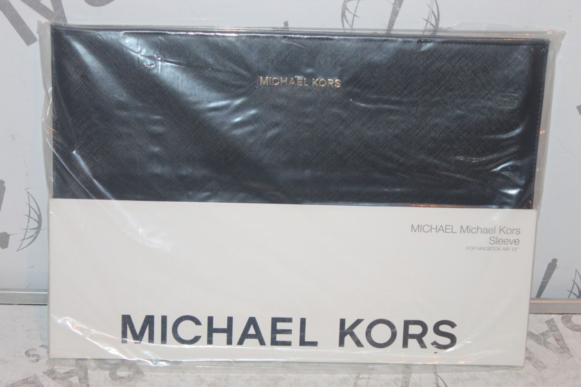 Lot to Contain 5 Brand New Michael Kors 13Inch Macbook Air Sleeves Combined RRP £100