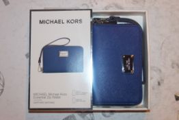 Lot to Contain 5 Boxed Brand New Michael Kors Iphone 4S, 5, 5C and 5S in Sapphire Zip Wallets