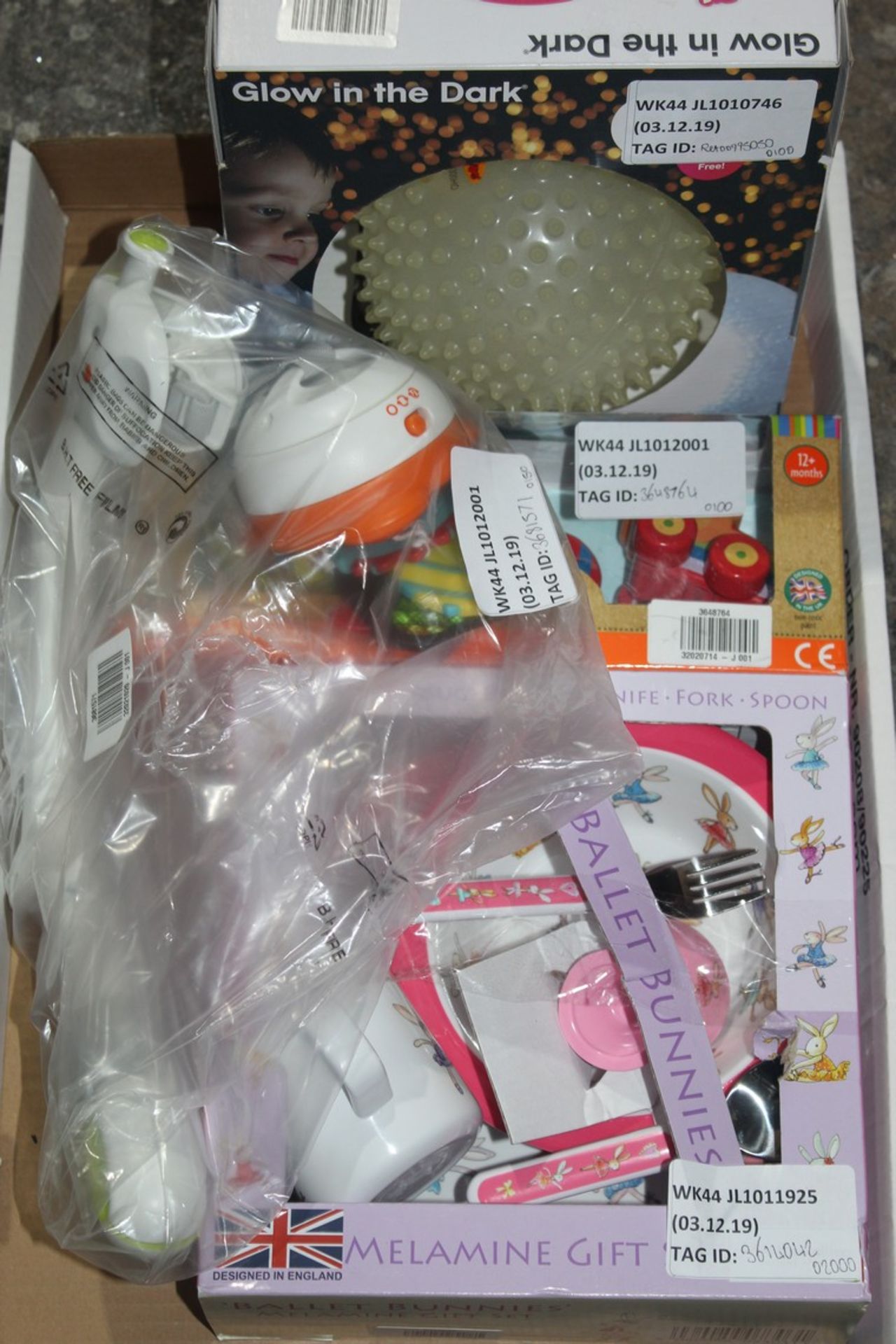 Box of Assorted Children's Items to Include Glow In The Dark Sensory Balls, Melamine Gift Pack