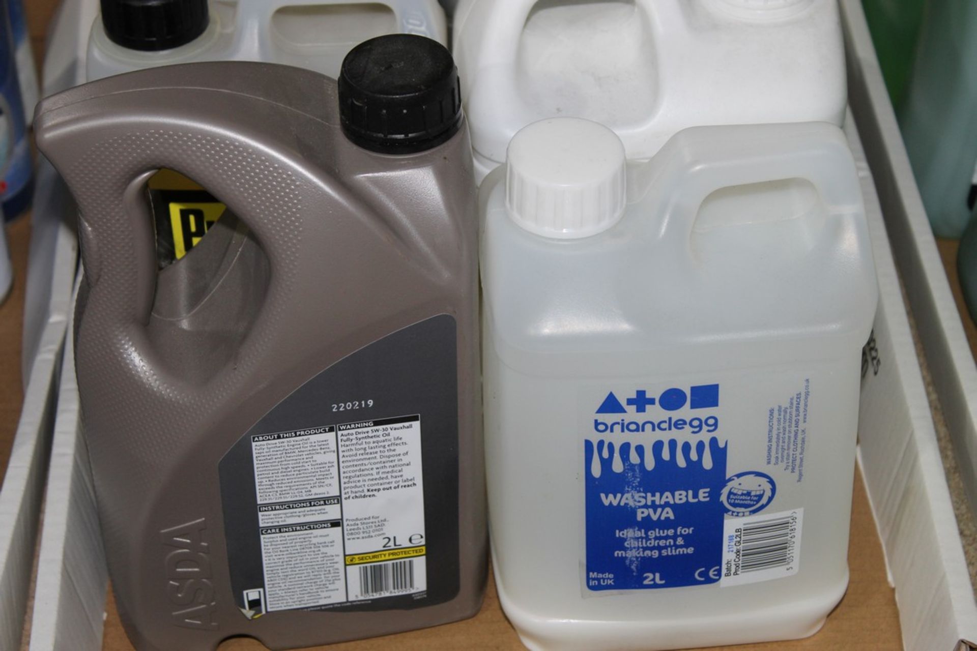 Assorted Items to Include 5W30 Semi Synthetic Motor Oil, Washable PA Glue, Auto Drive Anti Coolant