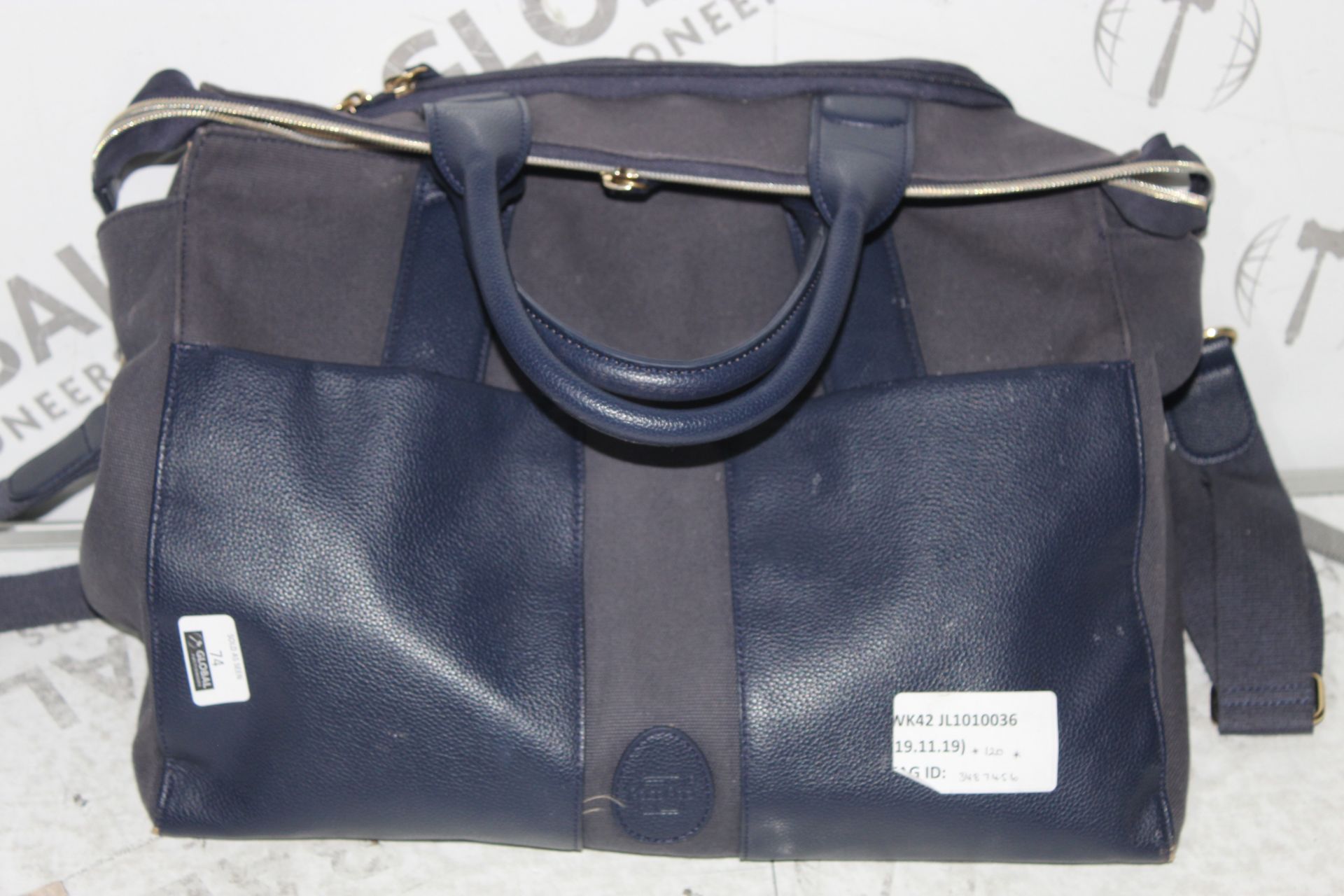 Pakapod Blue Leather Changing Bag RRP £120 (3487456) (Public Viewing and Appraisals Available)