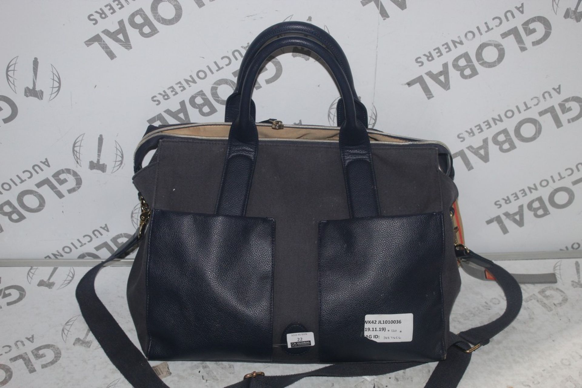 Pakkapod Navy Blue Leather Changing Bag RRP £120 (3487456) (Public Viewing and Appraisals