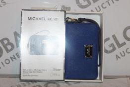 Lot to Contain 5 Boxed Brand New Michael Kors Iphone 4S, 5 5C, 5S and 6 Zip Wallets Combined RRP £