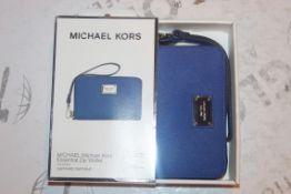 Lot to Contain 5 Boxed Brand New Michael Kors Ipho