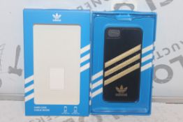 Lot to Contain 96 Brand New Adidas Iphone 5 Moulde