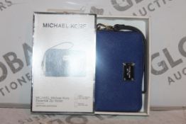 Lot to Contain 5 Boxed Brand New Michael Kors Iphone 4S, 5 5C, 5S and 6 Zip Wallets Combined RRP £