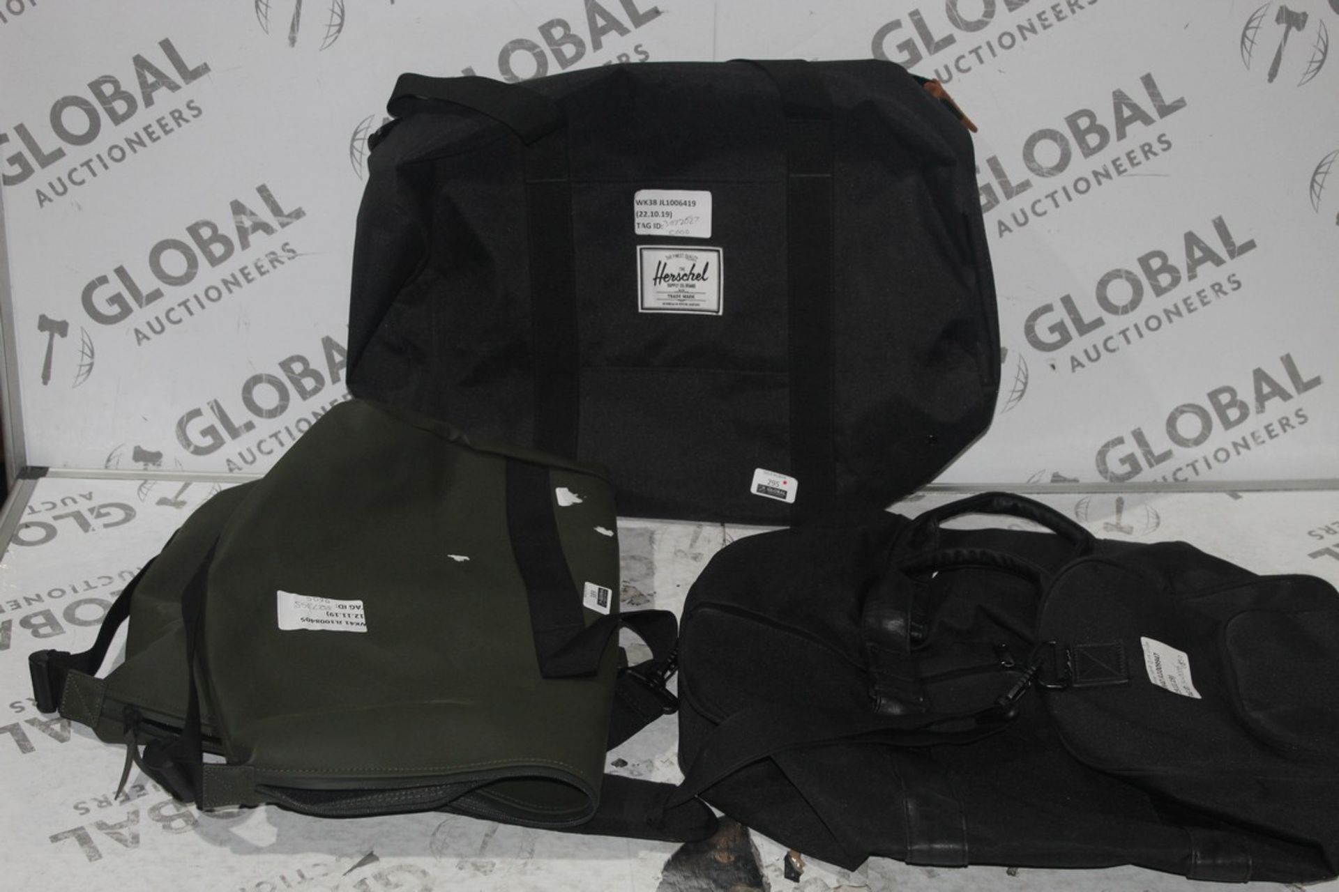 Assorted Rains and Herschel Holdalls RRP £60 Each (3327355)(3072627) (Public Viewing and