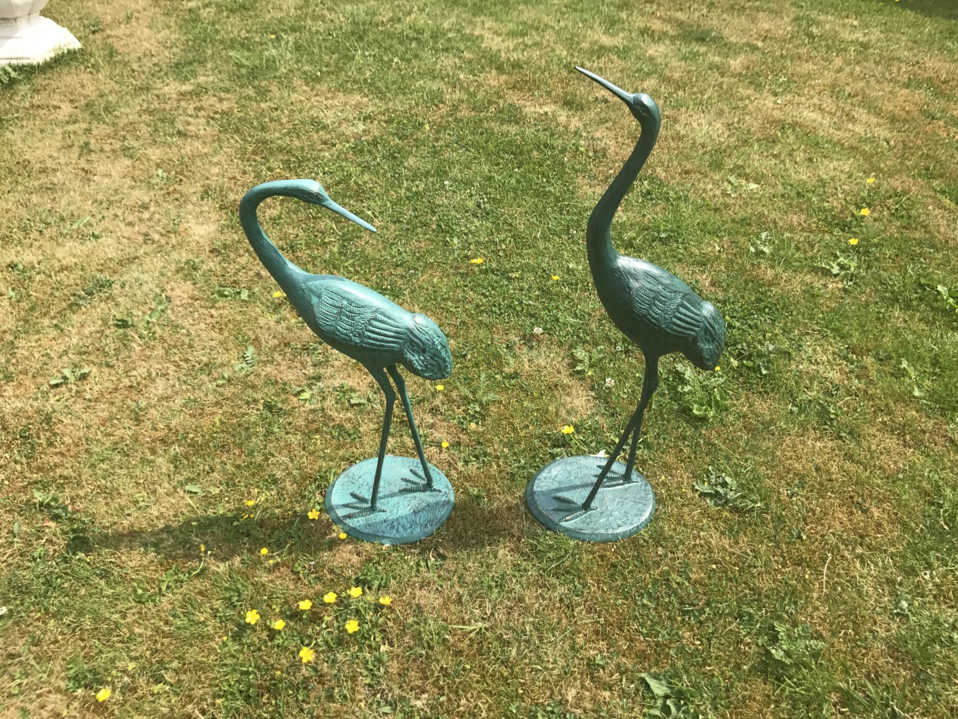 PAIR CAST METAL CRANES IN BRONZE FINISH