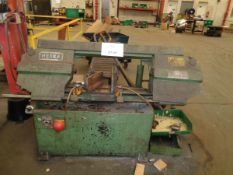 Heska band saw including rollers